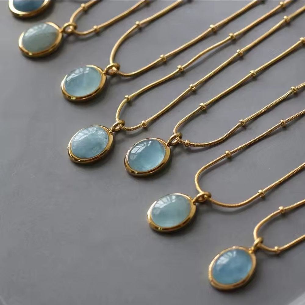 Elegant Gold and Blue Pendant Necklace